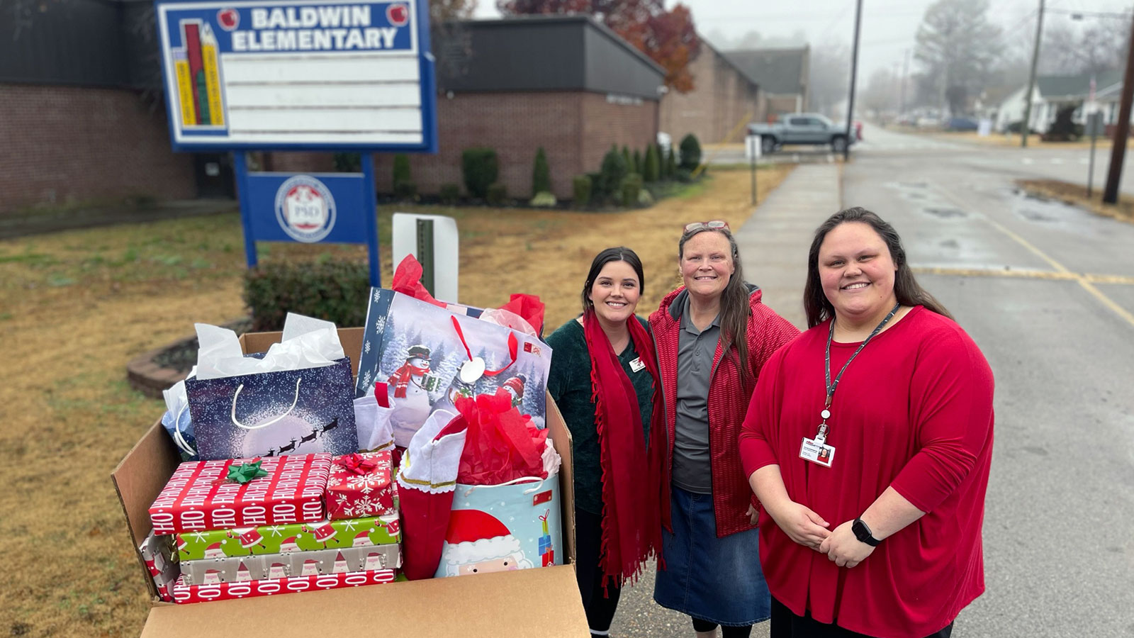 Baldwin Elementary receiving presents from the Paragould chamber's Partners in Education program