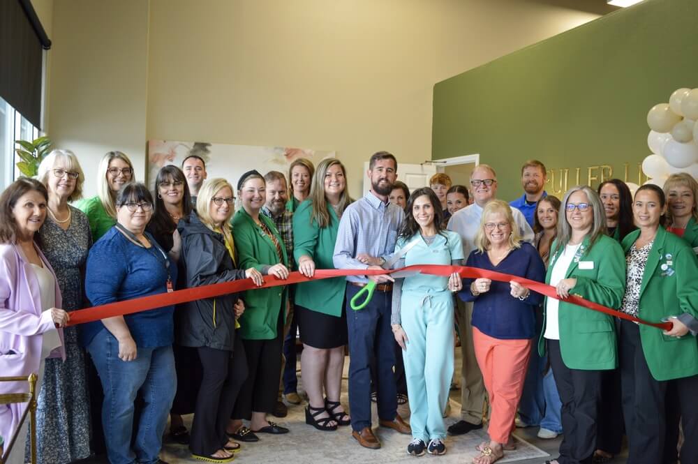 Fuller Life Wellness Center Ribbon cutting with employees and chamber members inside the lobby